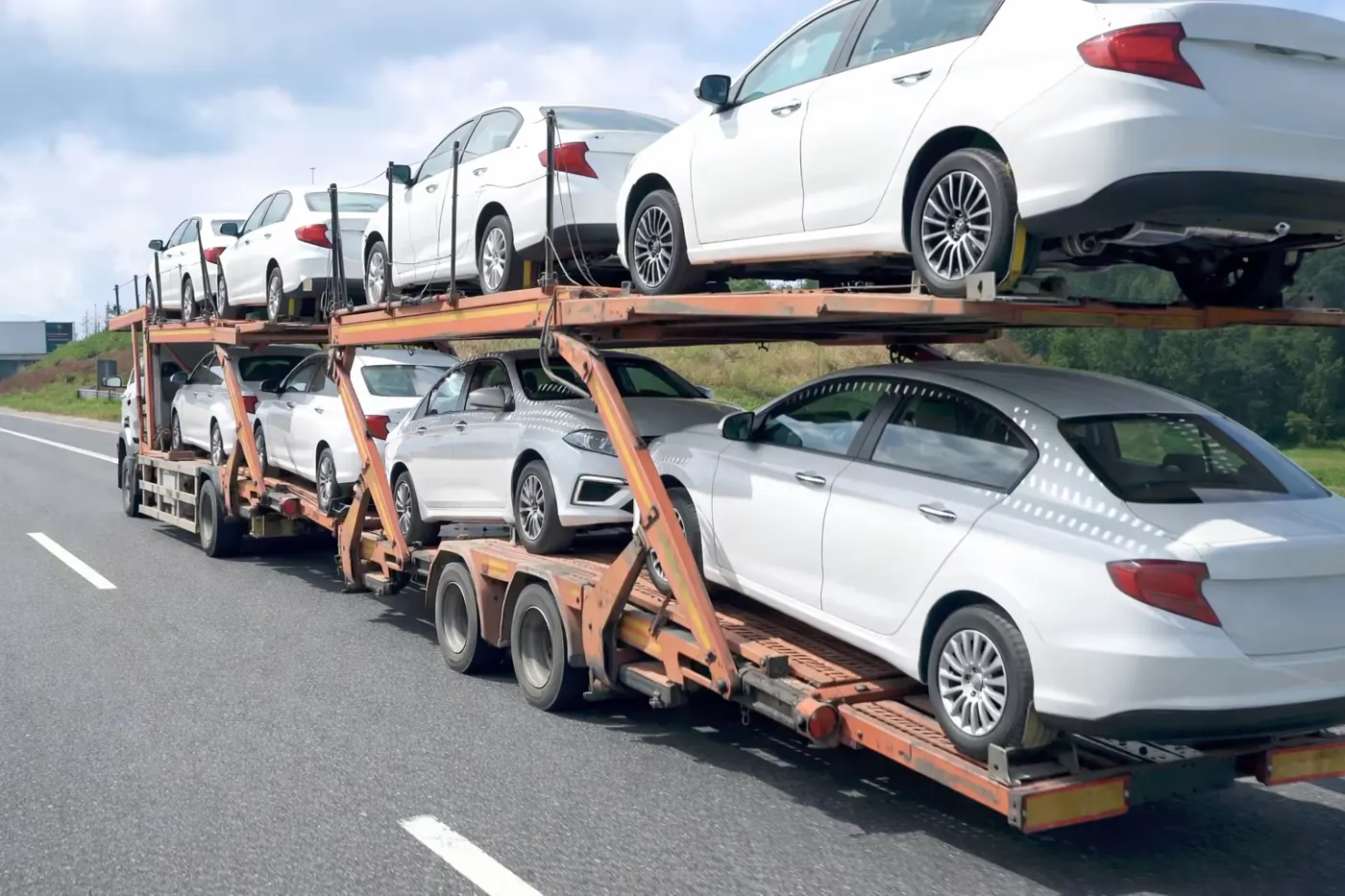 Car transporter delivering vehicles to the export port