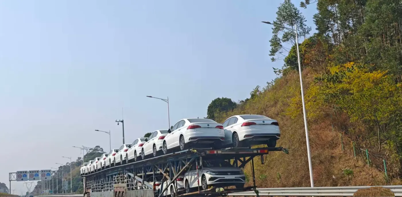 Car transporter carrying export vehicles on the highway