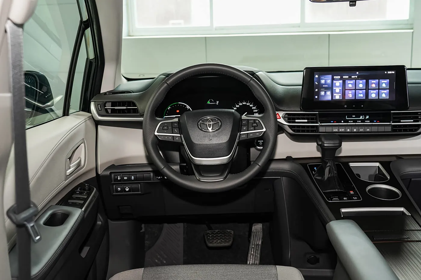 2026 Toyota Sienna — driver cockpit and centre screen | large hybrid MPV for export