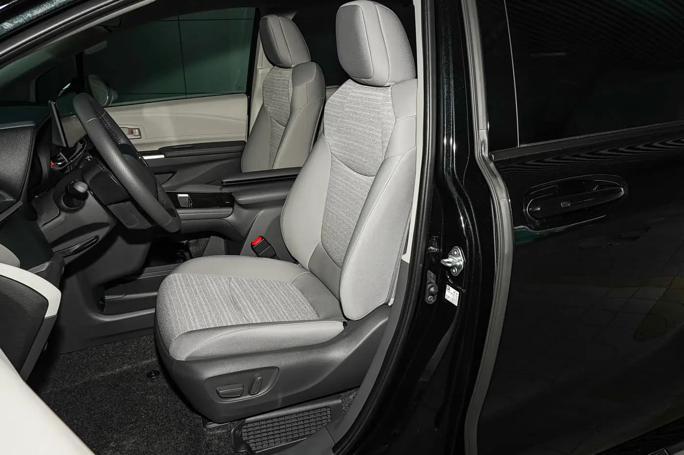 2026 Toyota Sienna — front seats | large hybrid MPV for export