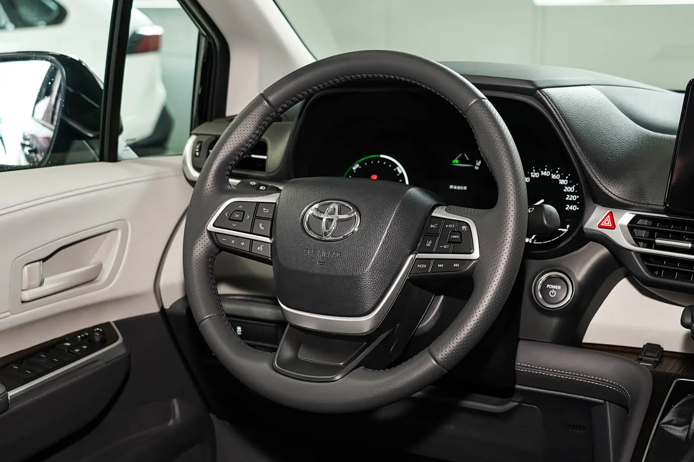 2026 Toyota Sienna — steering wheel and instrument cluster | large hybrid MPV for export
