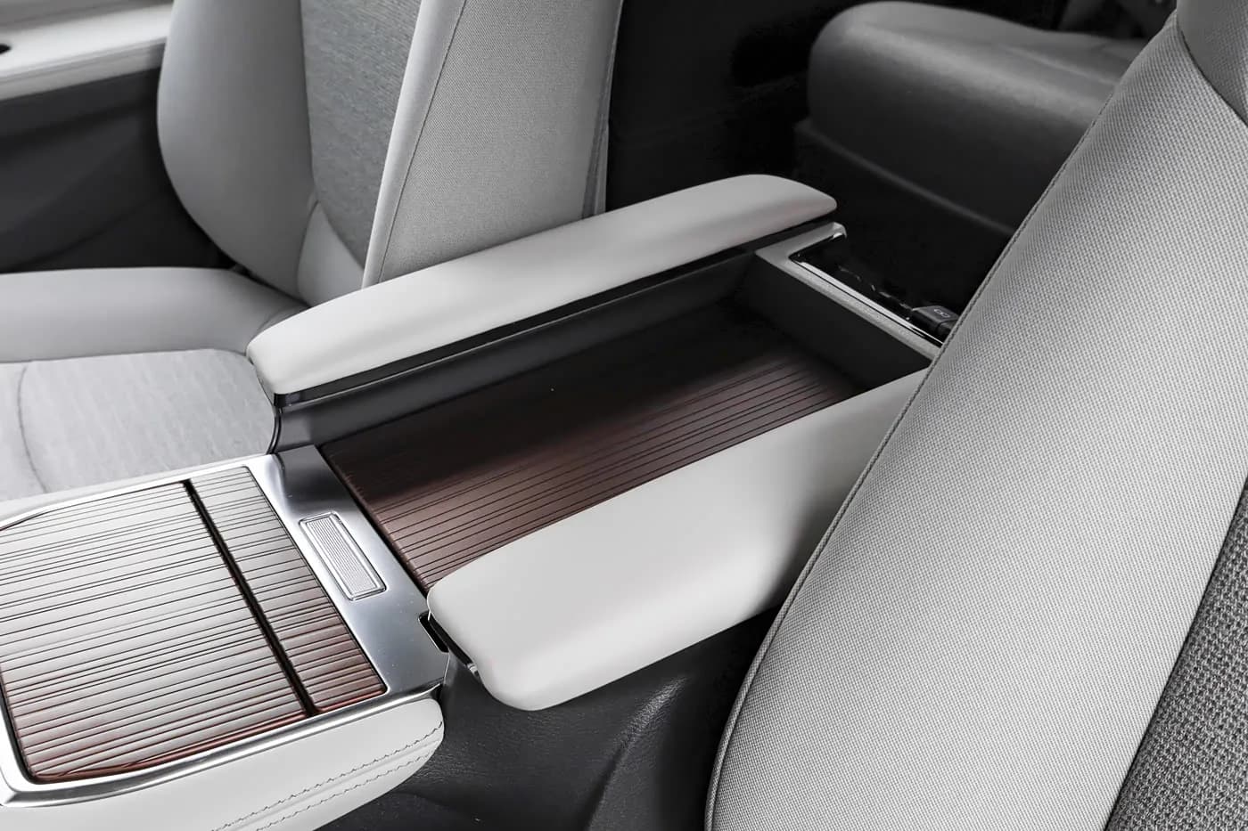 2027 Toyota Sienna — centre console and armrest | large hybrid MPV for export