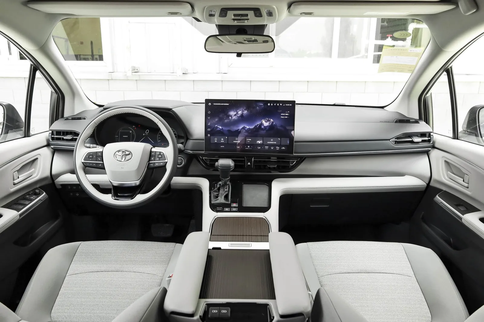 2027 Toyota Sienna — dashboard and front cabin | large hybrid MPV for export