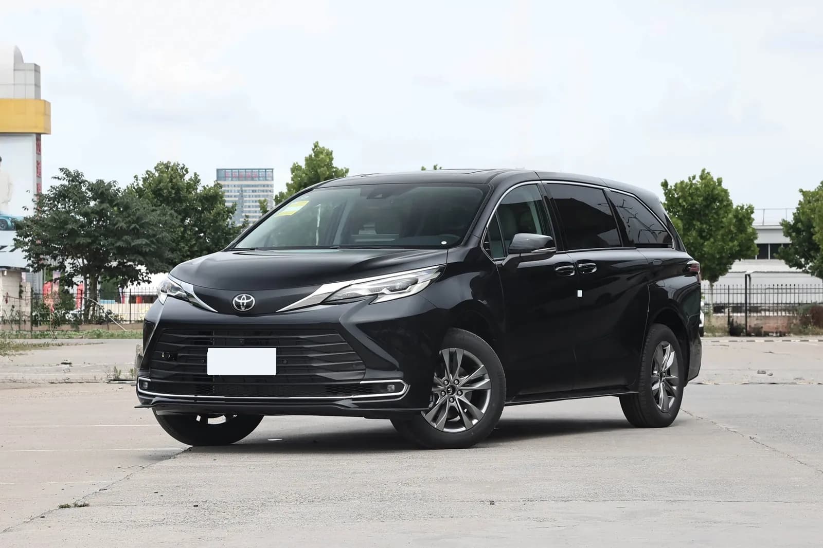 2027 Toyota Sienna hybrid MPV in Obsidian Black, front three-quarter view